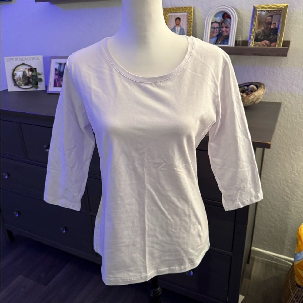 Brand new white top and size medium perfect for layering,